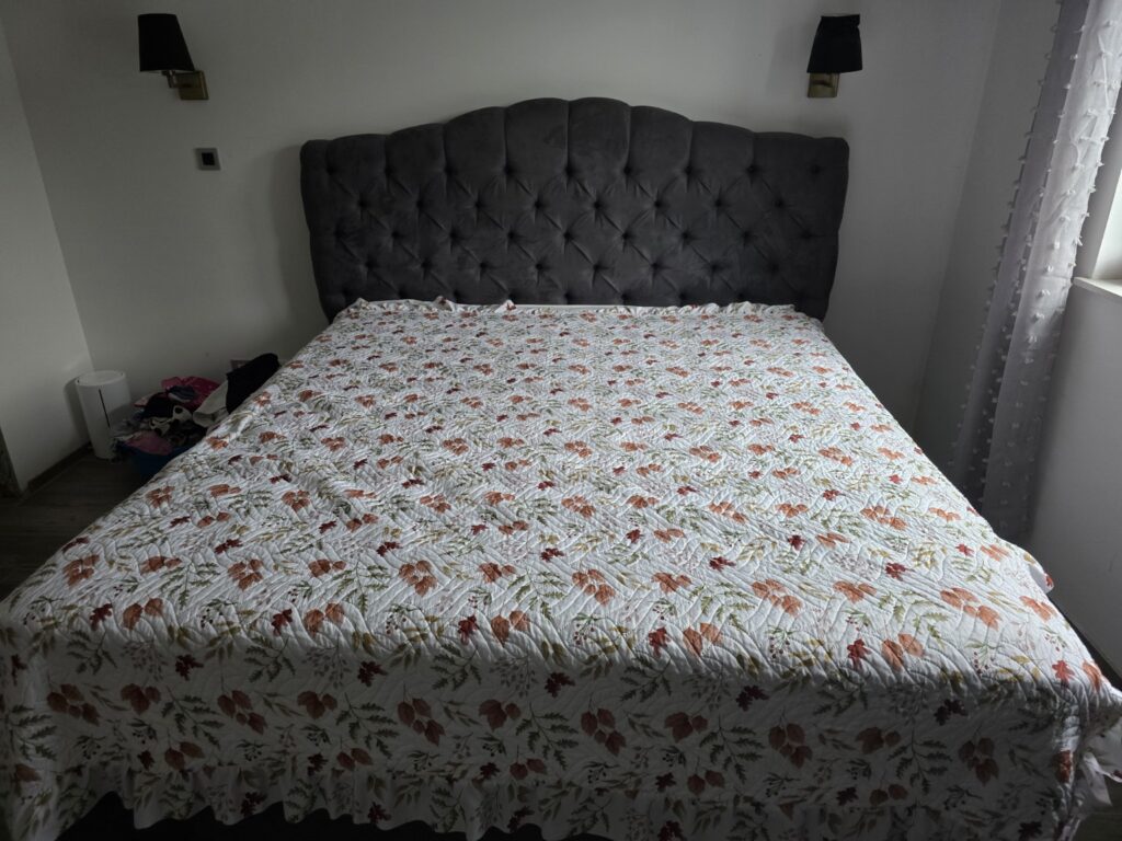 Clear and organized bed after putting laundry away